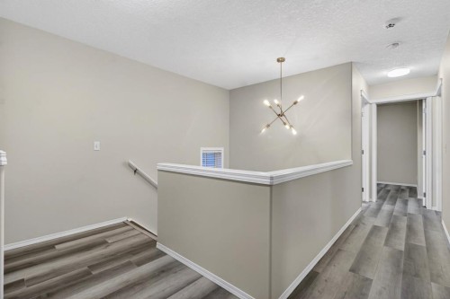 147 Everstone Rise Sw, Calgary, AB - Indoor Photo Showing Other Room