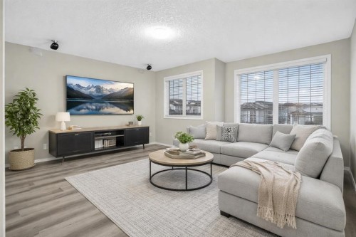 147 Everstone Rise Sw, Calgary, AB - Indoor Photo Showing Living Room