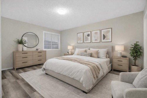 147 Everstone Rise Sw, Calgary, AB - Indoor Photo Showing Bedroom