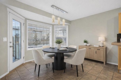 147 Everstone Rise Sw, Calgary, AB - Indoor Photo Showing Dining Room