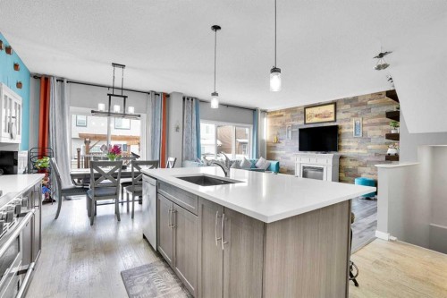 100 Kingsbury Close Se, Airdrie, AB - Indoor Photo Showing Kitchen With Upgraded Kitchen