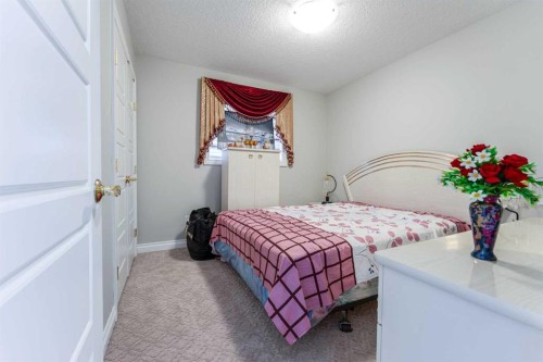 47 Saddlelake Way Ne, Calgary, AB - Indoor Photo Showing Bedroom