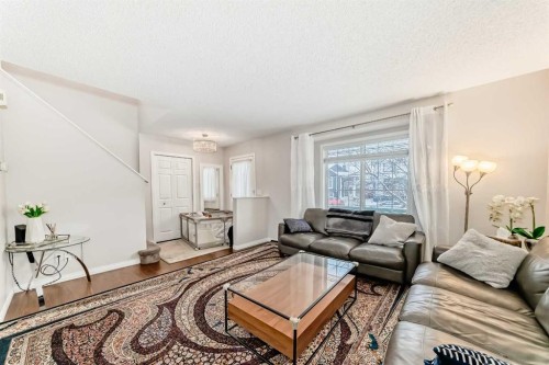 206 Evansmeade Close Nw, Calgary, AB - Indoor Photo Showing Living Room