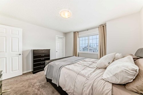206 Evansmeade Close Nw, Calgary, AB - Indoor Photo Showing Bedroom
