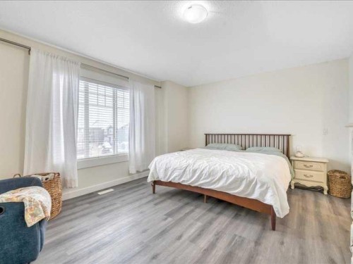 201 Rainbow Falls Glen, Chestermere, AB - Indoor Photo Showing Bedroom