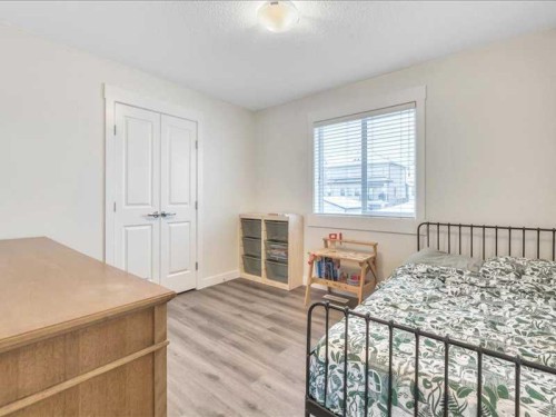 201 Rainbow Falls Glen, Chestermere, AB - Indoor Photo Showing Bedroom