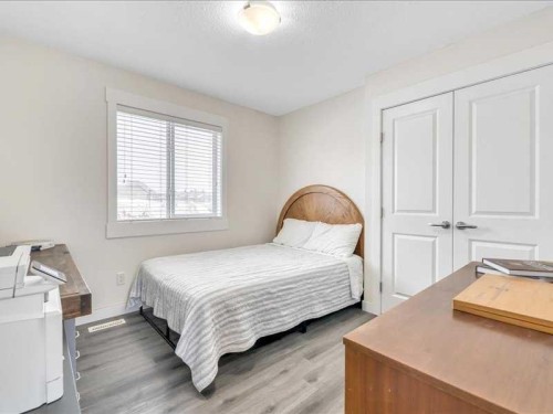 201 Rainbow Falls Glen, Chestermere, AB - Indoor Photo Showing Bedroom