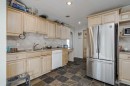 1468 Renfrew Drive Ne, Calgary, AB  - Indoor Photo Showing Kitchen With Double Sink 