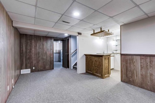 123 Woodsman Lane Sw, Calgary, AB - Indoor Photo Showing Other Room