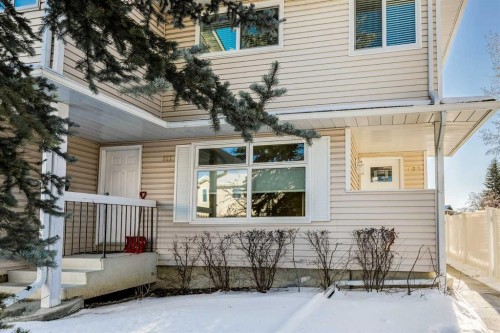 123 Woodsman Lane Sw, Calgary, AB - Outdoor With Deck Patio Veranda