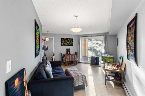 1207-4975 130 Avenue Se, Calgary, AB - Indoor Photo Showing Living Room