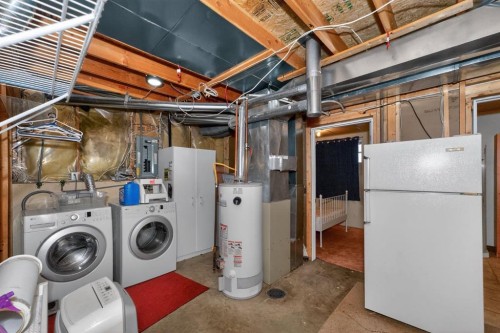 43 Somercrest Circle Sw, Calgary, AB - Indoor Photo Showing Laundry Room