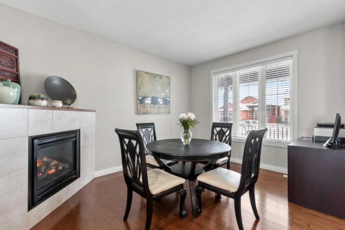 6 Vera Close, Olds, AB - Indoor Photo Showing Dining Room With Fireplace