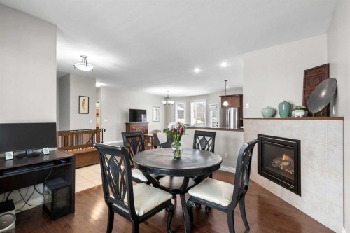 6 Vera Close, Olds, AB - Indoor Photo Showing Dining Room With Fireplace