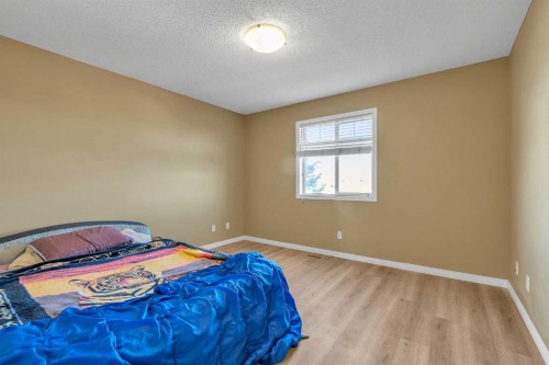 101-2384 Sagewood Gate Sw, Airdrie, AB - Indoor Photo Showing Bedroom