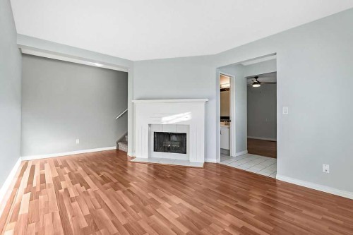 55-740 Bracewood Drive Sw, Calgary, AB - Indoor With Fireplace