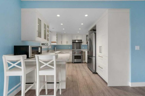 31 Edforth Way Nw, Calgary, AB - Indoor Photo Showing Kitchen With Stainless Steel Kitchen