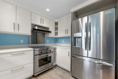 31 Edforth Way Nw, Calgary, AB - Indoor Photo Showing Kitchen With Stainless Steel Kitchen