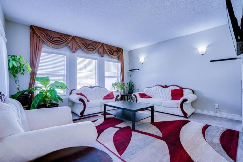 77 Saddleland Drive Ne, Calgary, AB - Indoor Photo Showing Living Room