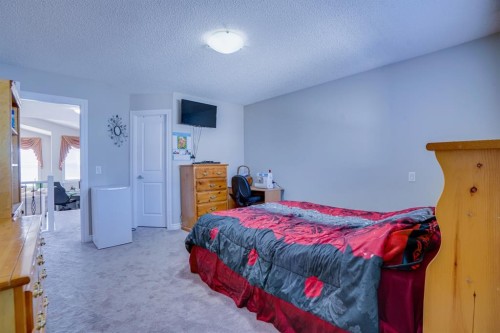 77 Saddleland Drive Ne, Calgary, AB - Indoor Photo Showing Bedroom