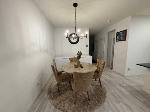 119 Edith Drive Nw, Calgary, AB - Indoor Photo Showing Dining Room