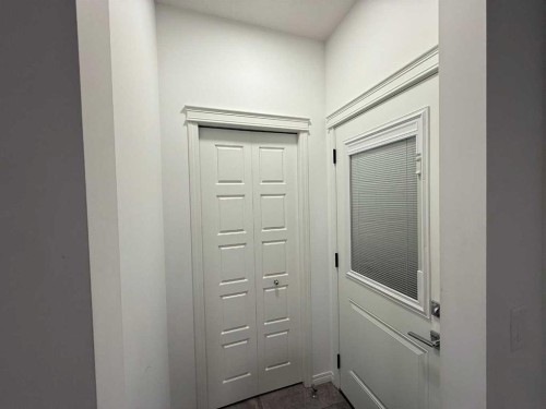 119 Edith Drive Nw, Calgary, AB - Indoor Photo Showing Other Room