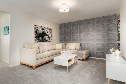 63 Creekside Path Sw, Calgary, AB - Indoor Photo Showing Living Room