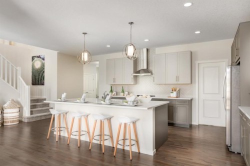 63 Creekside Path Sw, Calgary, AB - Indoor Photo Showing Kitchen With Double Sink With Upgraded Kitchen