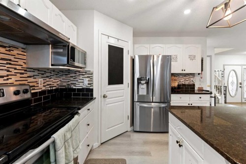 140 Fairways Drive Nw, Airdrie, AB - Indoor Photo Showing Kitchen With Stainless Steel Kitchen