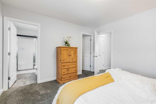 251 Kingsbridge Road Se, Airdrie, AB - Indoor Photo Showing Bedroom