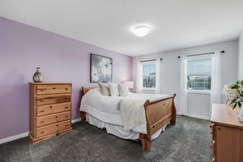 251 Kingsbridge Road Se, Airdrie, AB - Indoor Photo Showing Bedroom