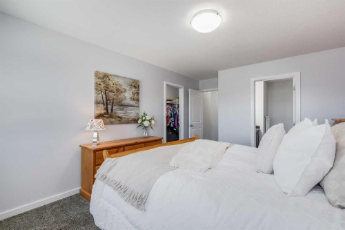 251 Kingsbridge Road Se, Airdrie, AB - Indoor Photo Showing Bedroom