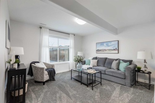 251 Kingsbridge Road Se, Airdrie, AB - Indoor Photo Showing Living Room