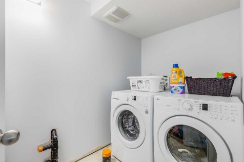 251 Kingsbridge Road Se, Airdrie, AB - Indoor Photo Showing Laundry Room