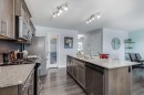 251 Kingsbridge Road Se, Airdrie, AB  - Indoor Photo Showing Kitchen With Double Sink With Upgraded Kitchen 