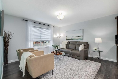 251 Kingsbridge Road Se, Airdrie, AB - Indoor Photo Showing Living Room