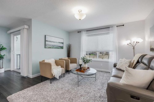 251 Kingsbridge Road Se, Airdrie, AB - Indoor Photo Showing Living Room
