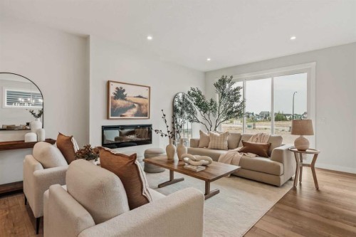 223 Creekstone Circle Sw, Calgary, AB - Indoor Photo Showing Living Room With Fireplace