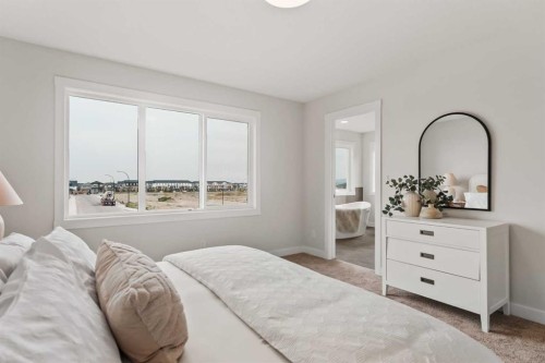 223 Creekstone Circle Sw, Calgary, AB - Indoor Photo Showing Bedroom
