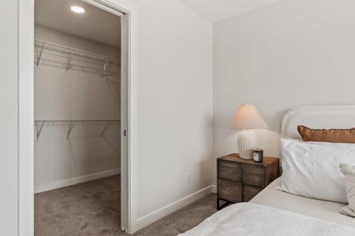 223 Creekstone Circle Sw, Calgary, AB - Indoor Photo Showing Bedroom