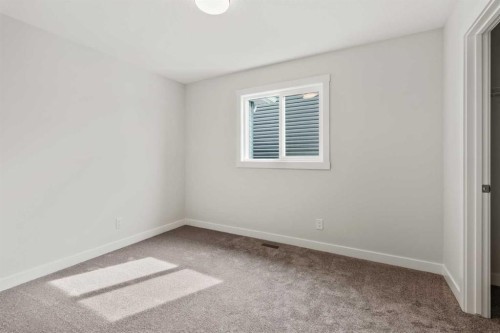 223 Creekstone Circle Sw, Calgary, AB - Indoor Photo Showing Other Room