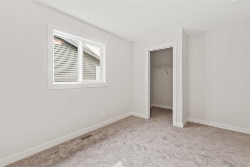 223 Creekstone Circle Sw, Calgary, AB - Indoor Photo Showing Other Room