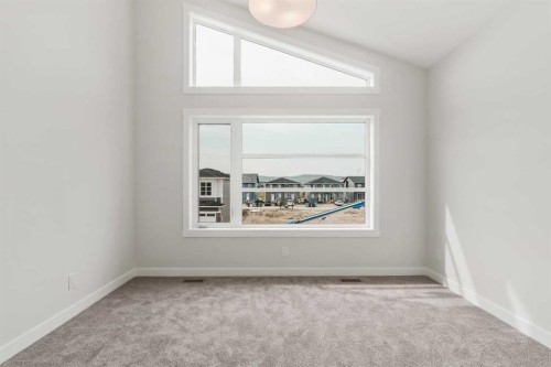 223 Creekstone Circle Sw, Calgary, AB - Indoor Photo Showing Other Room