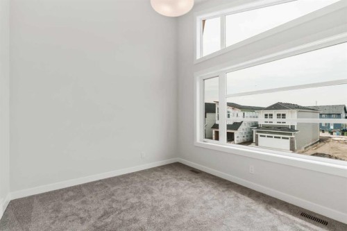 223 Creekstone Circle Sw, Calgary, AB - Indoor Photo Showing Other Room