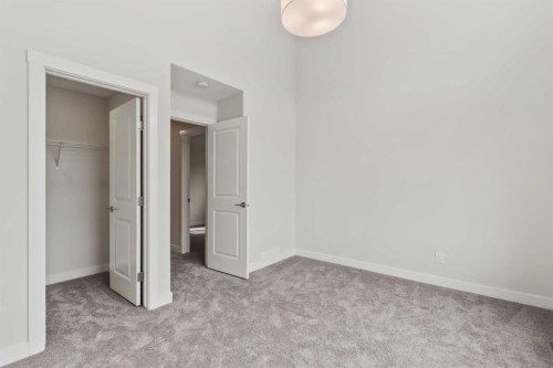 223 Creekstone Circle Sw, Calgary, AB - Indoor Photo Showing Other Room
