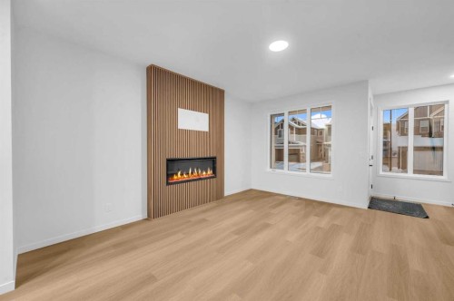 94 Royston Park Nw, Calgary, AB - Indoor With Fireplace