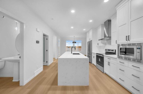 94 Royston Park Nw, Calgary, AB - Indoor Photo Showing Kitchen With Upgraded Kitchen