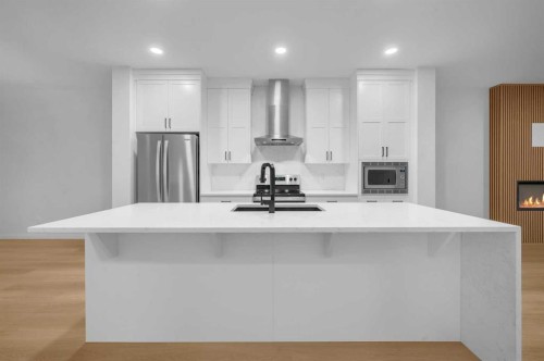 94 Royston Park Nw, Calgary, AB - Indoor Photo Showing Kitchen With Stainless Steel Kitchen With Upgraded Kitchen