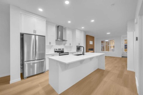 94 Royston Park Nw, Calgary, AB - Indoor Photo Showing Kitchen With Stainless Steel Kitchen With Upgraded Kitchen