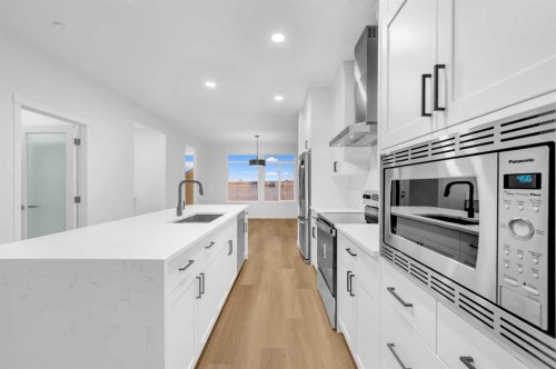 94 Royston Park Nw, Calgary, AB - Indoor Photo Showing Kitchen With Upgraded Kitchen
